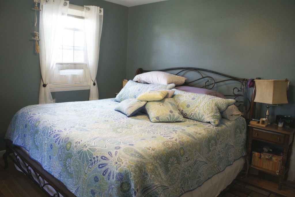 149 Endecott Street Springfield, MA 01118 - Photo 9 of 23 a bedroom with a bed and window