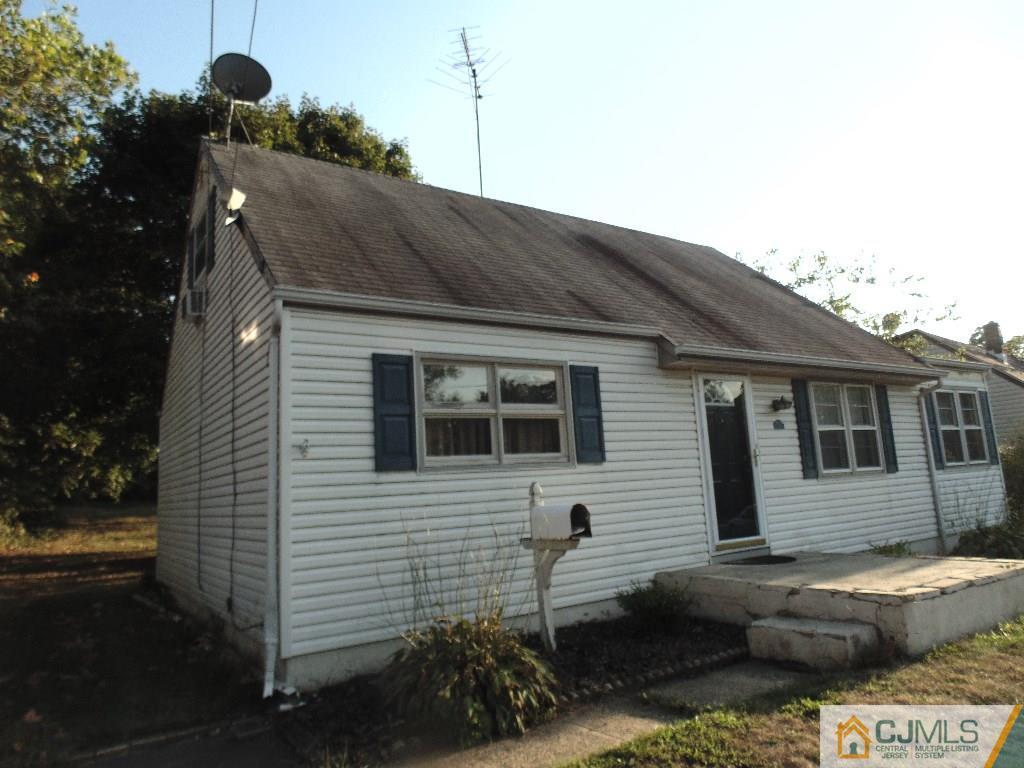 a front view of a house with yard
