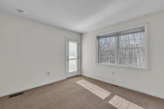 a view of a hallway with elevator