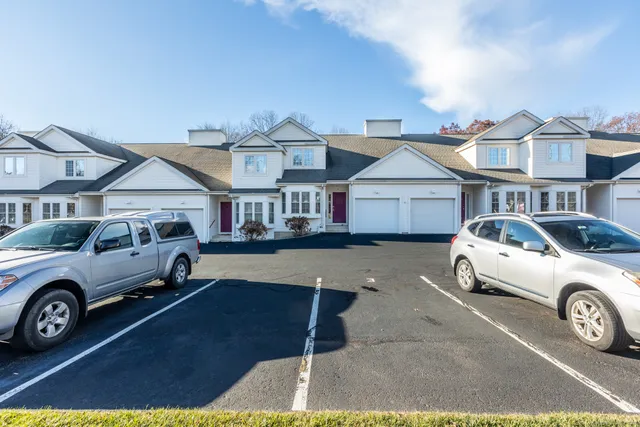 a car parked in front of a house