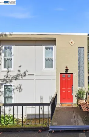 a view of a swimming pool with a yard and trees