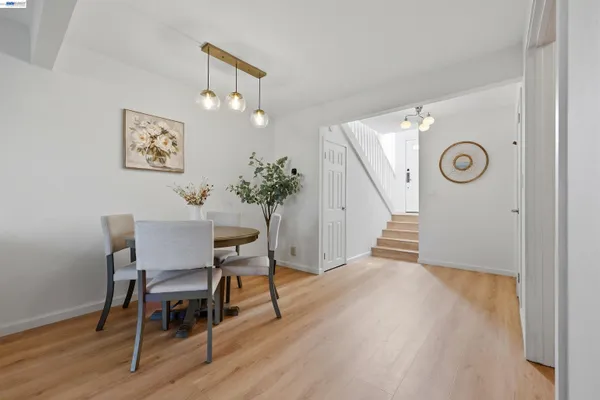 a view of a hallway with seating area