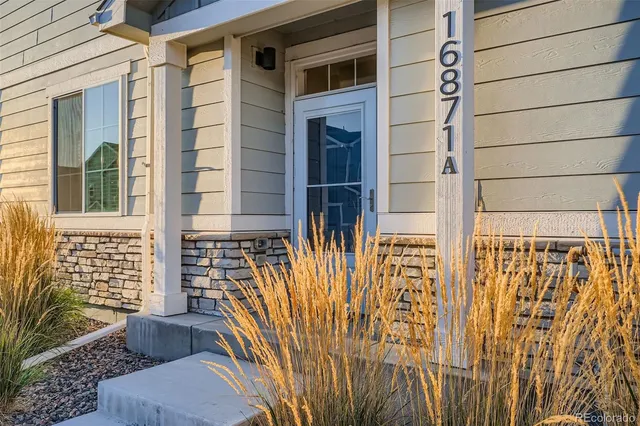 a view of a street from a balcony