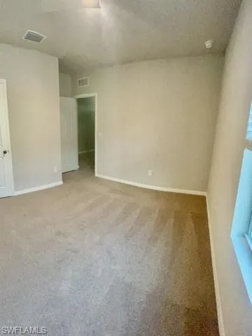 an empty room with an entryway