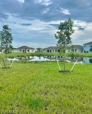 a view of a golf course with a lake