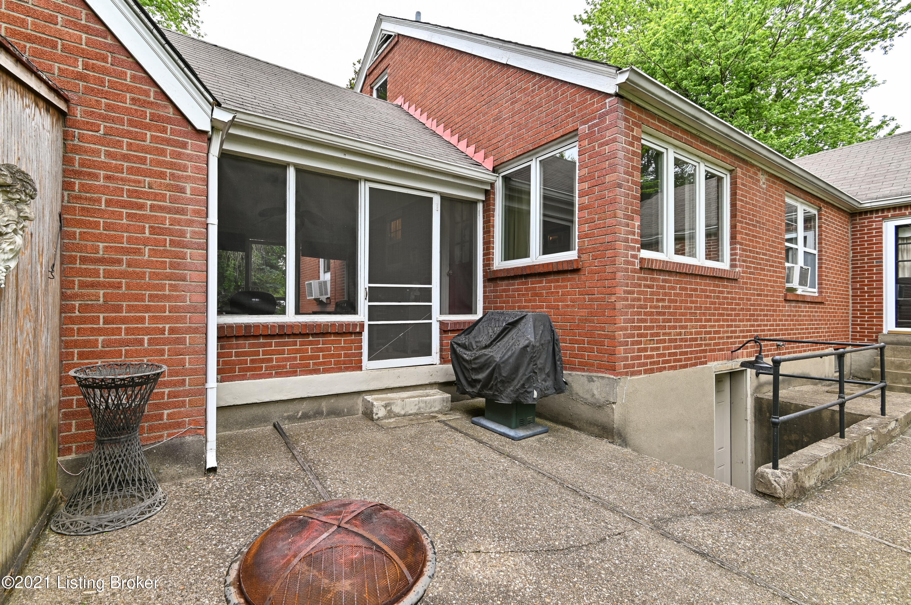 3957 Cane Run Road Louisville, KY 40216 - Photo 26 of 31 Great patio space and outdoor access to basement
