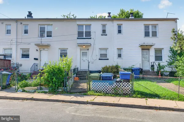 front view of a house with a garden