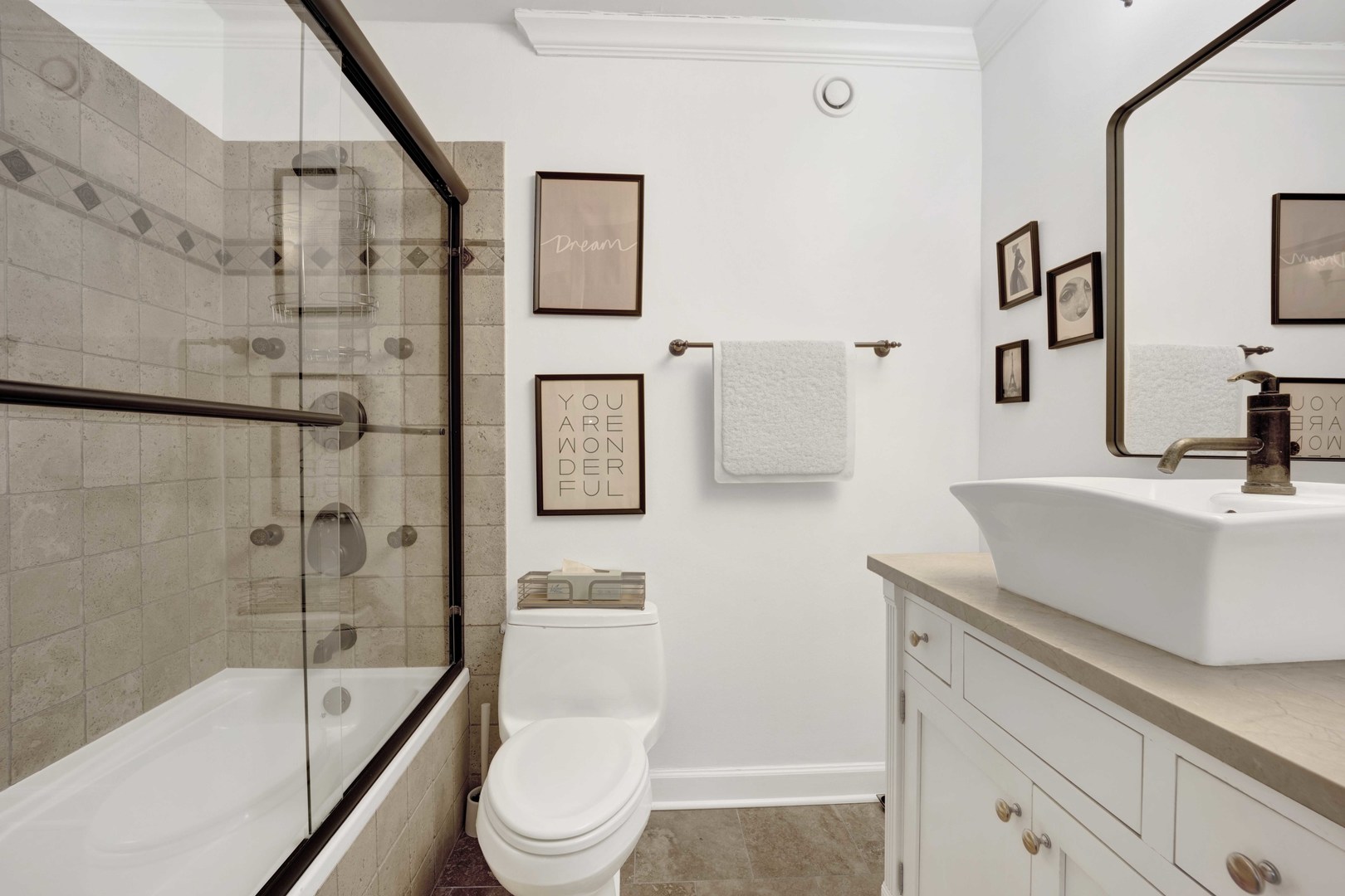 30 East Huron Street, Unit 3206 Chicago, IL 60611 - Photo 13 of 29 a bathroom with a sink a toilet and shower