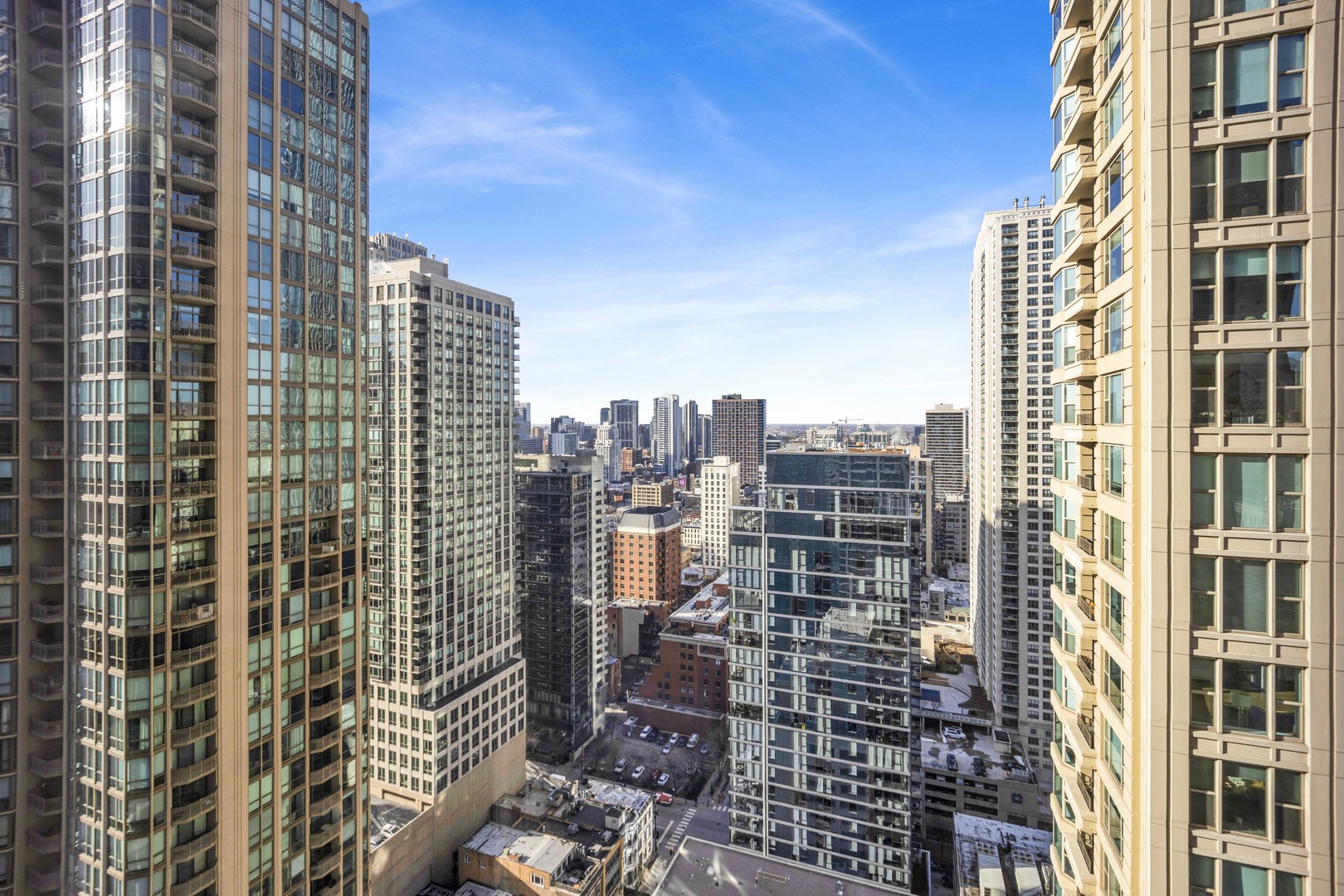 30 East Huron Street, Unit 3206 Chicago, IL 60611 - Photo 15 of 29 a city view with tall buildings