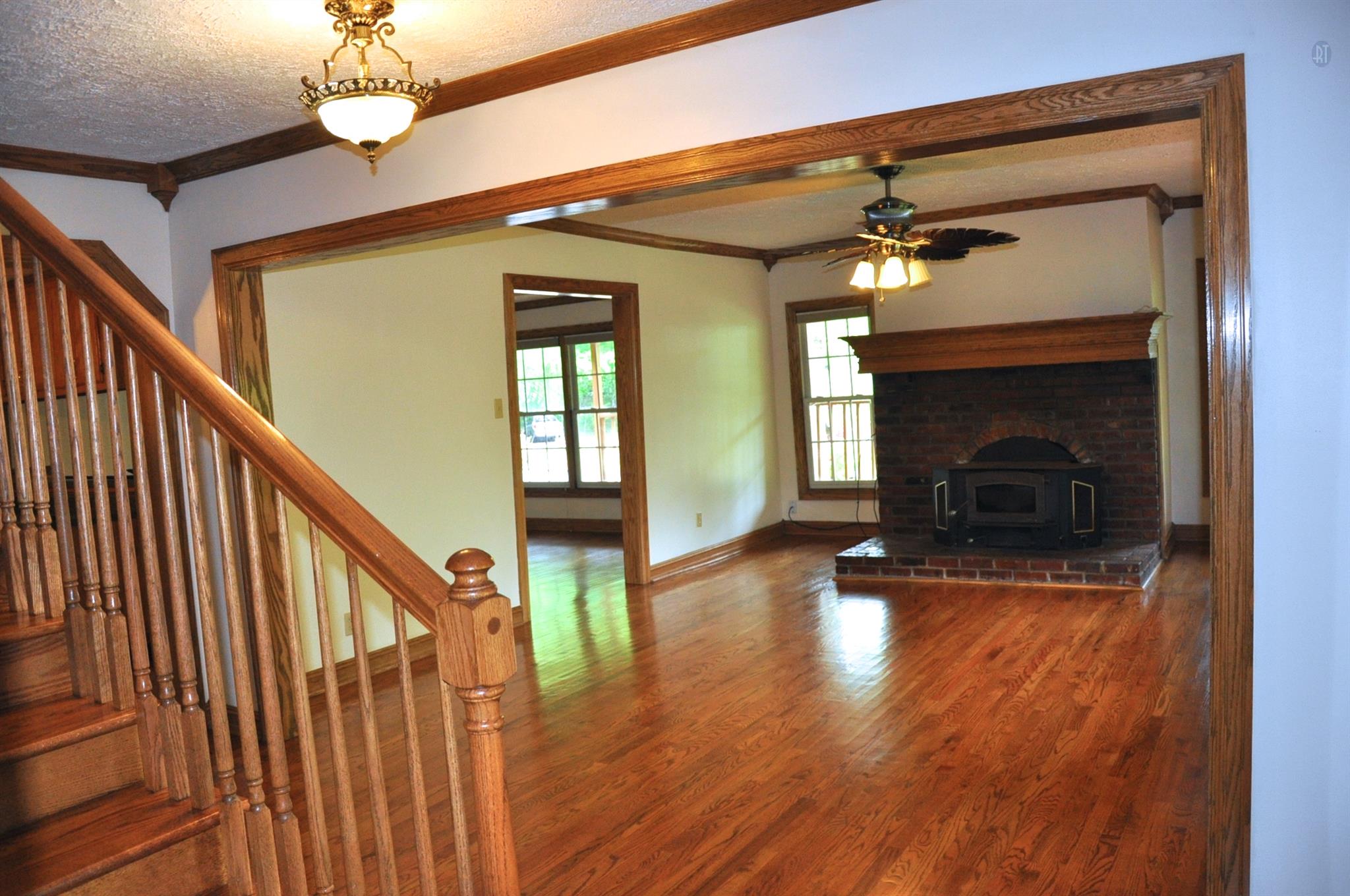 8013 Mill Road Cross Plains, TN 37049 - Photo 20 of 26 a view of a livingroom with fireplace and wooden floor