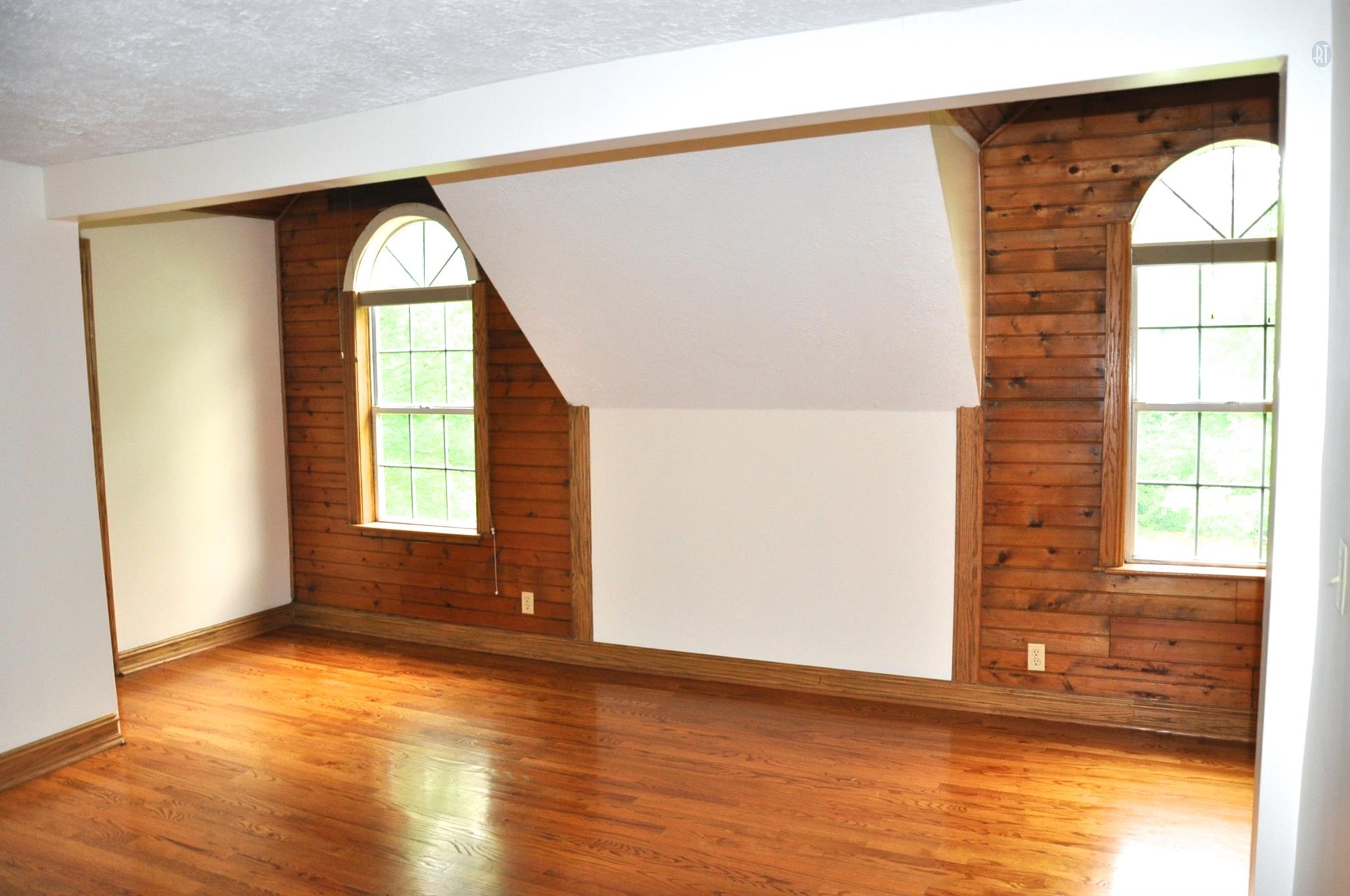 8013 Mill Road Cross Plains, TN 37049 - Photo 22 of 26 a view of empty room with wooden floor and fan