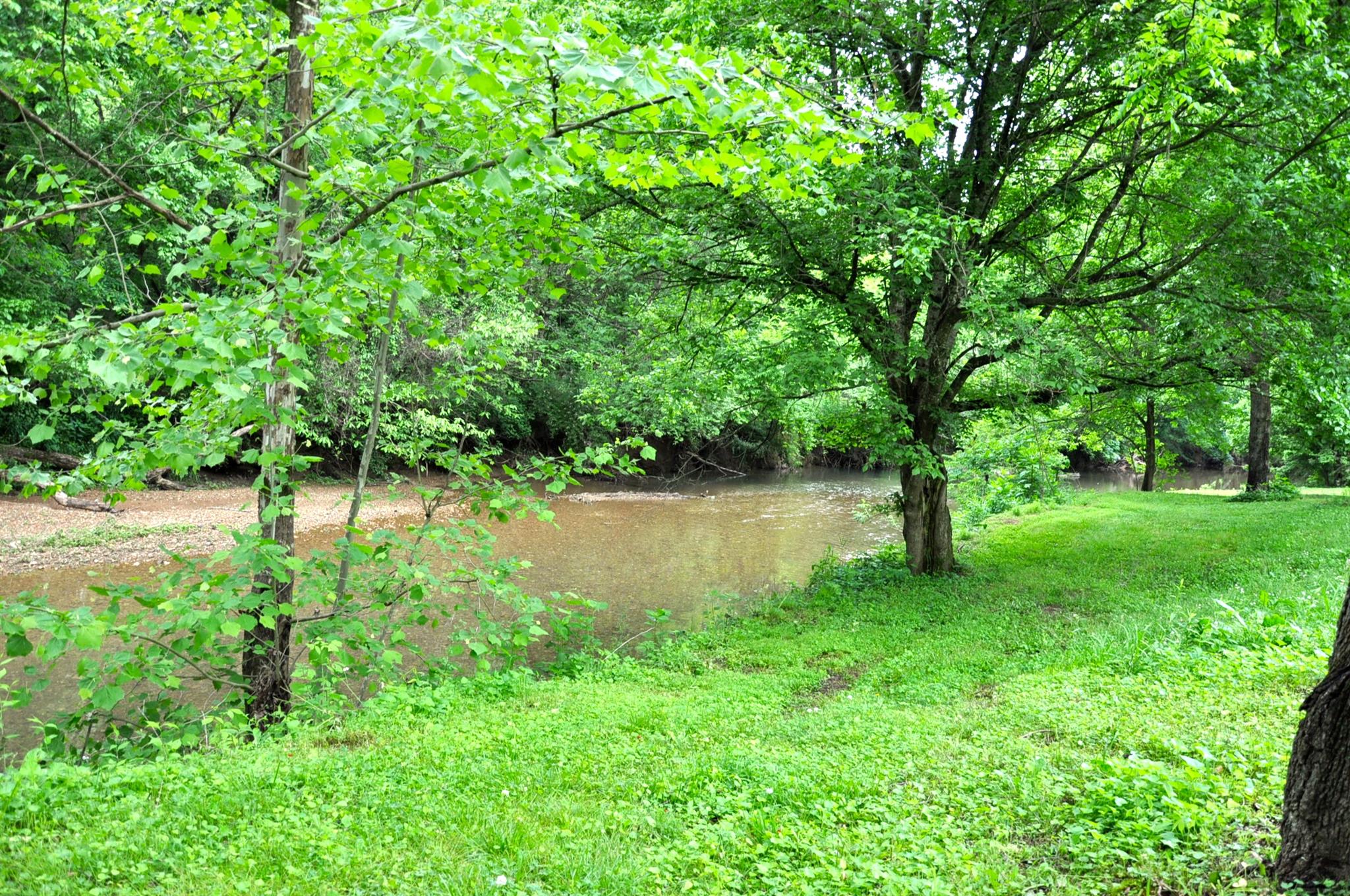 8013 Mill Road Cross Plains, TN 37049 - Photo 26 of 26 a view of green field with trees in the background