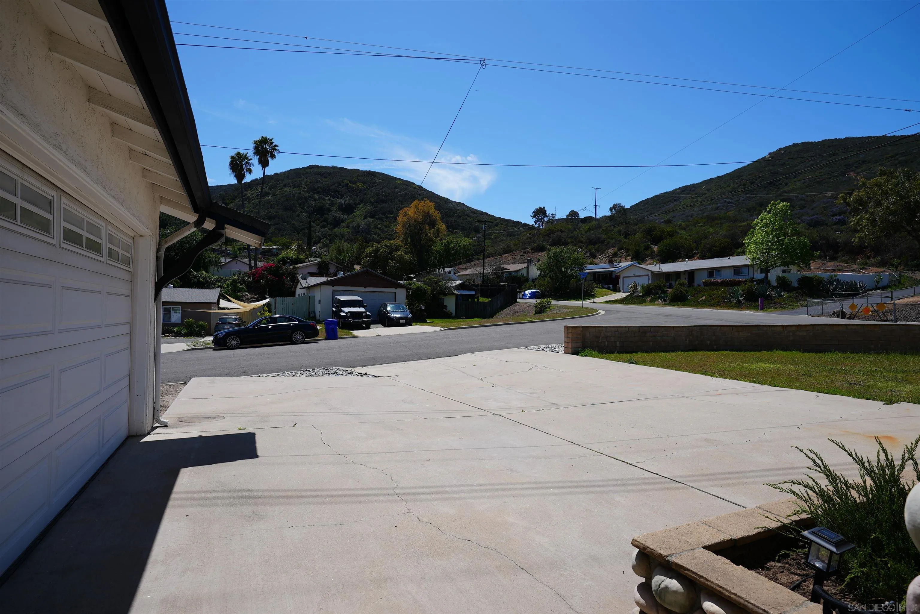 7902 Poplin Drive Santee, CA 92071 - Photo 11 of 59 a view of street with parked cars