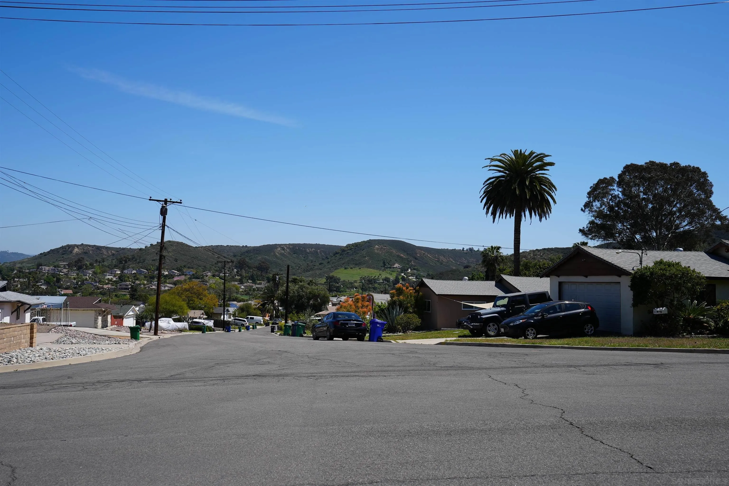 7902 Poplin Drive Santee, CA 92071 - Photo 12 of 59 a view of street with a car parked