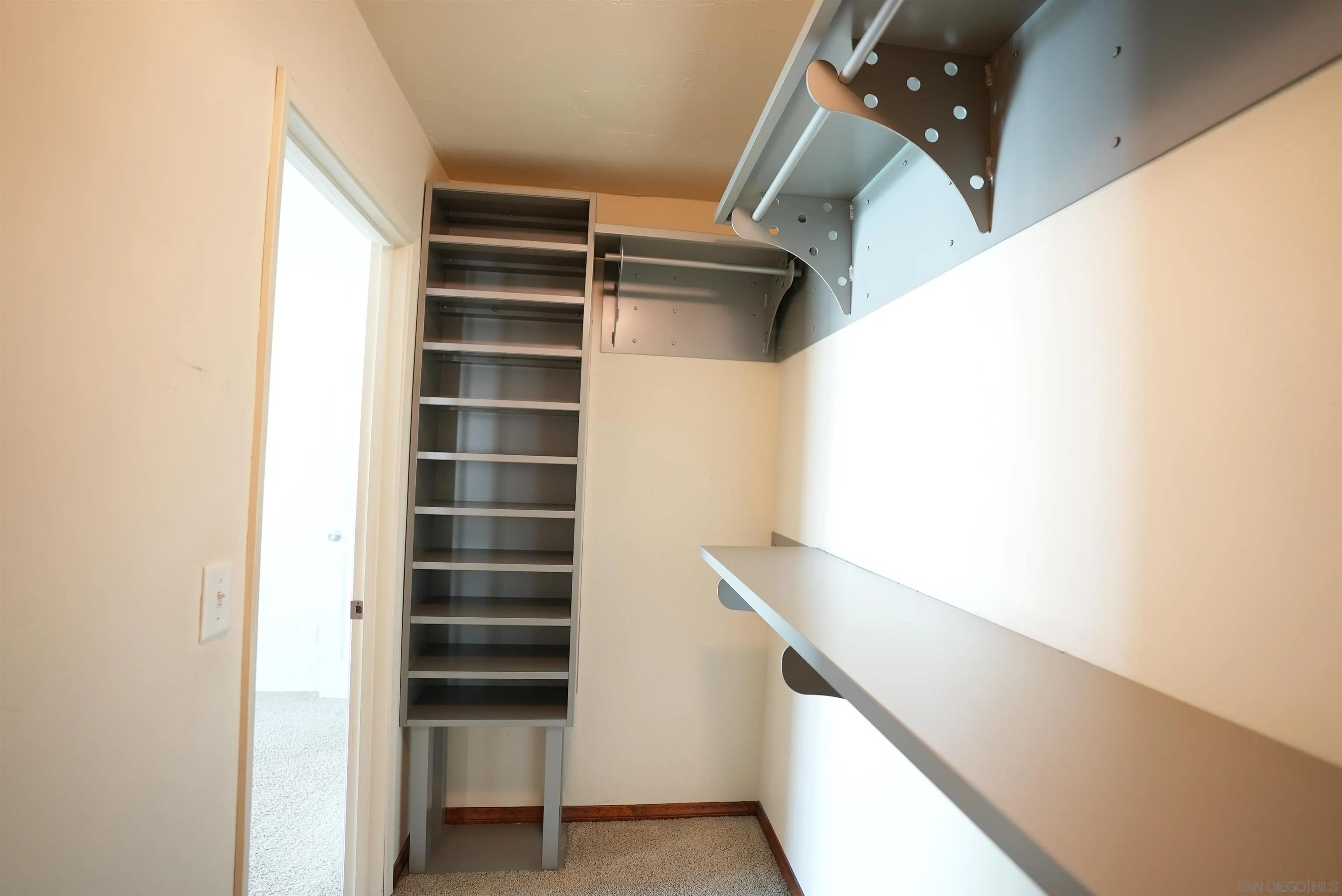 7902 Poplin Drive Santee, CA 92071 - Photo 29 of 59 a view of walk in closet with empty racks