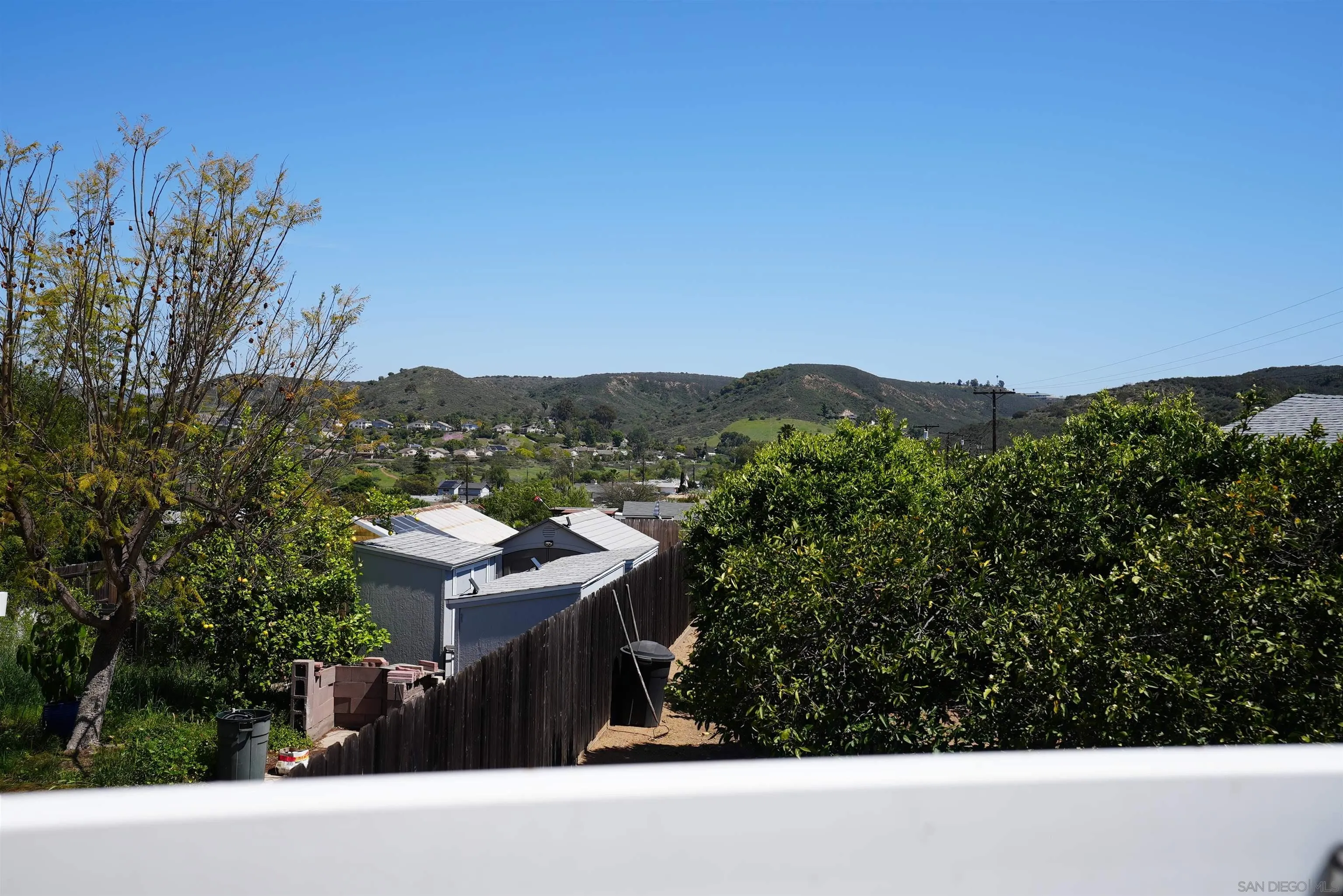 7902 Poplin Drive Santee, CA 92071 - Photo 45 of 59 a view of a terrace with a garden and trees