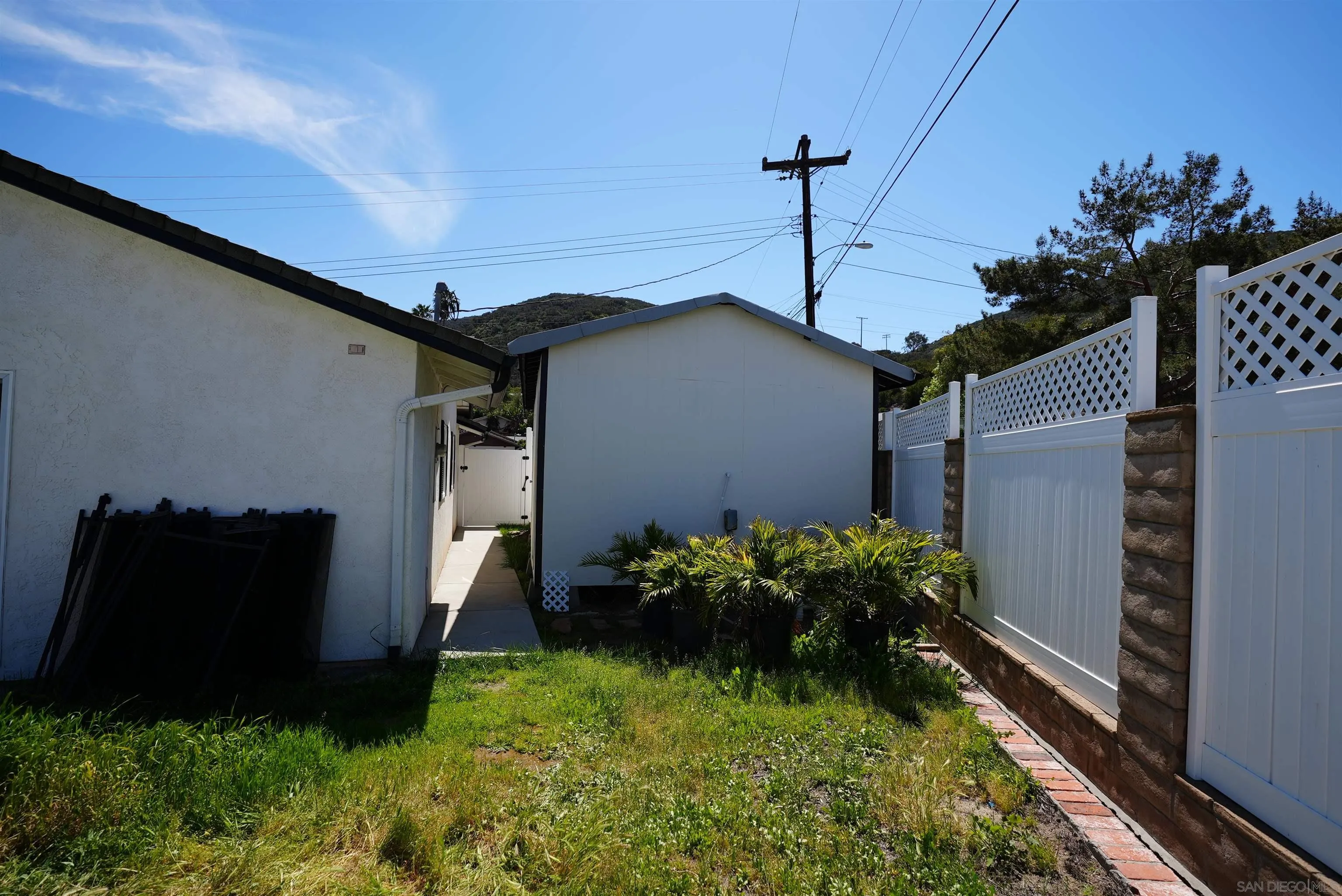 7902 Poplin Drive Santee, CA 92071 - Photo 50 of 59 a backyard of a house with lots of green space