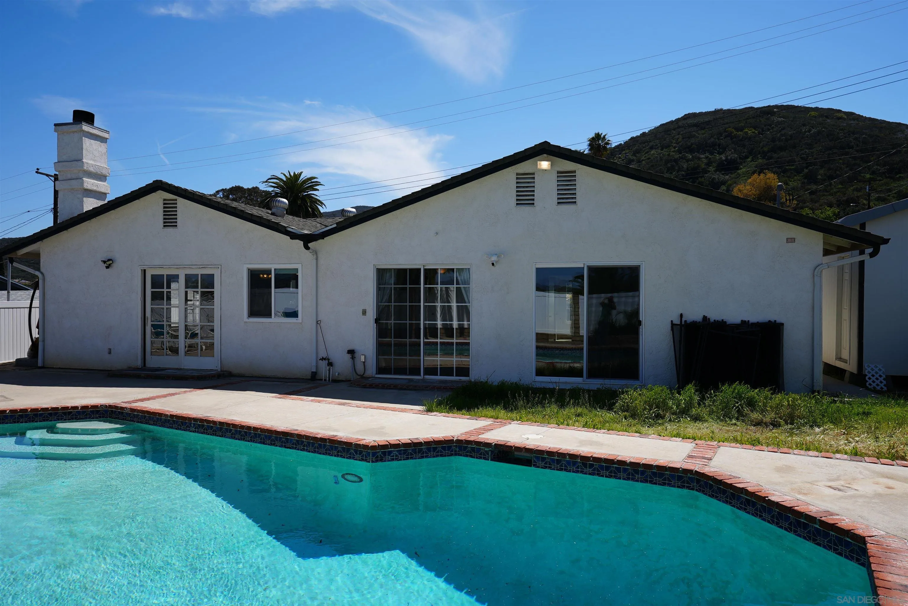 7902 Poplin Drive Santee, CA 92071 - Photo 56 of 59 a view of a house with swimming pool and yard