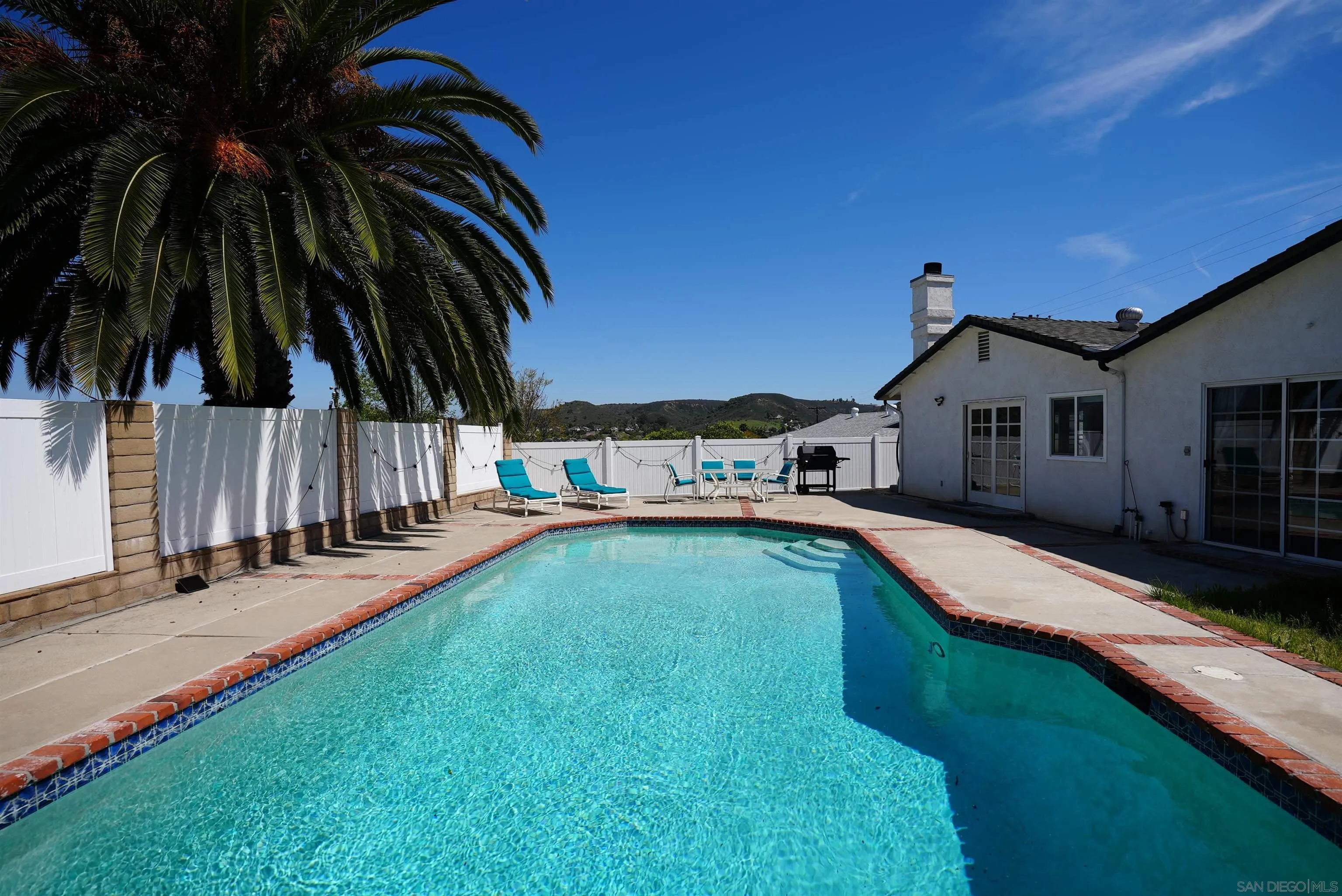 7902 Poplin Drive Santee, CA 92071 - Photo 57 of 59 a view of swimming pool with chair and tables
