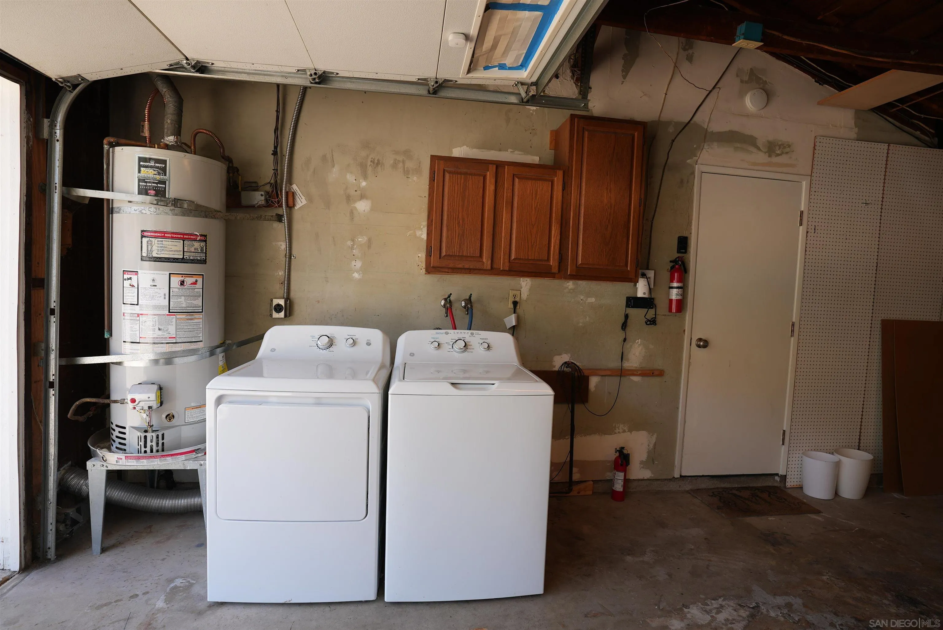 7902 Poplin Drive Santee, CA 92071 - Photo 59 of 59 a utility room with dryer and washer