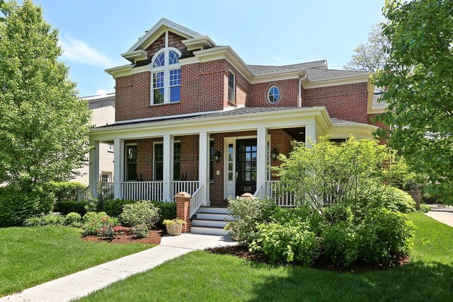 615 Courtland Avenue Park Ridge, IL 60068 - Photo 1 of 29 a front view of a house with a yard and trees