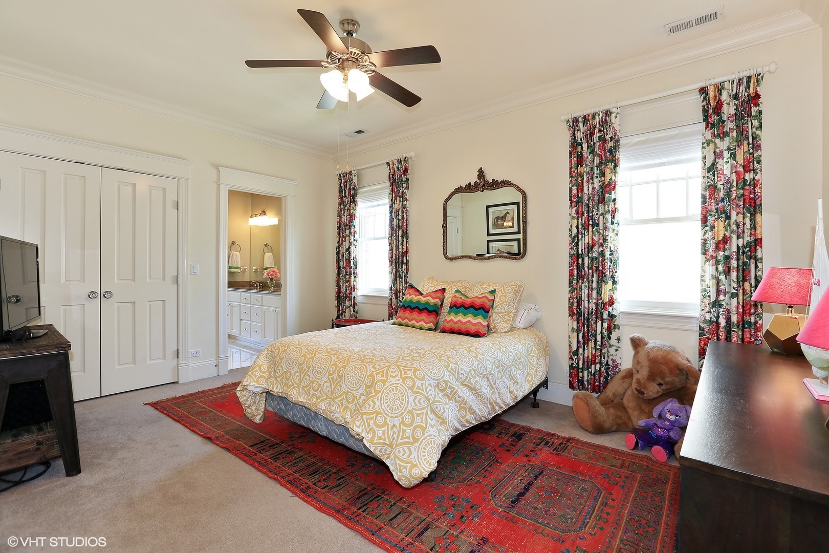 615 Courtland Avenue Park Ridge, IL 60068 - Photo 18 of 29 a bedroom with a bed and a chandelier
