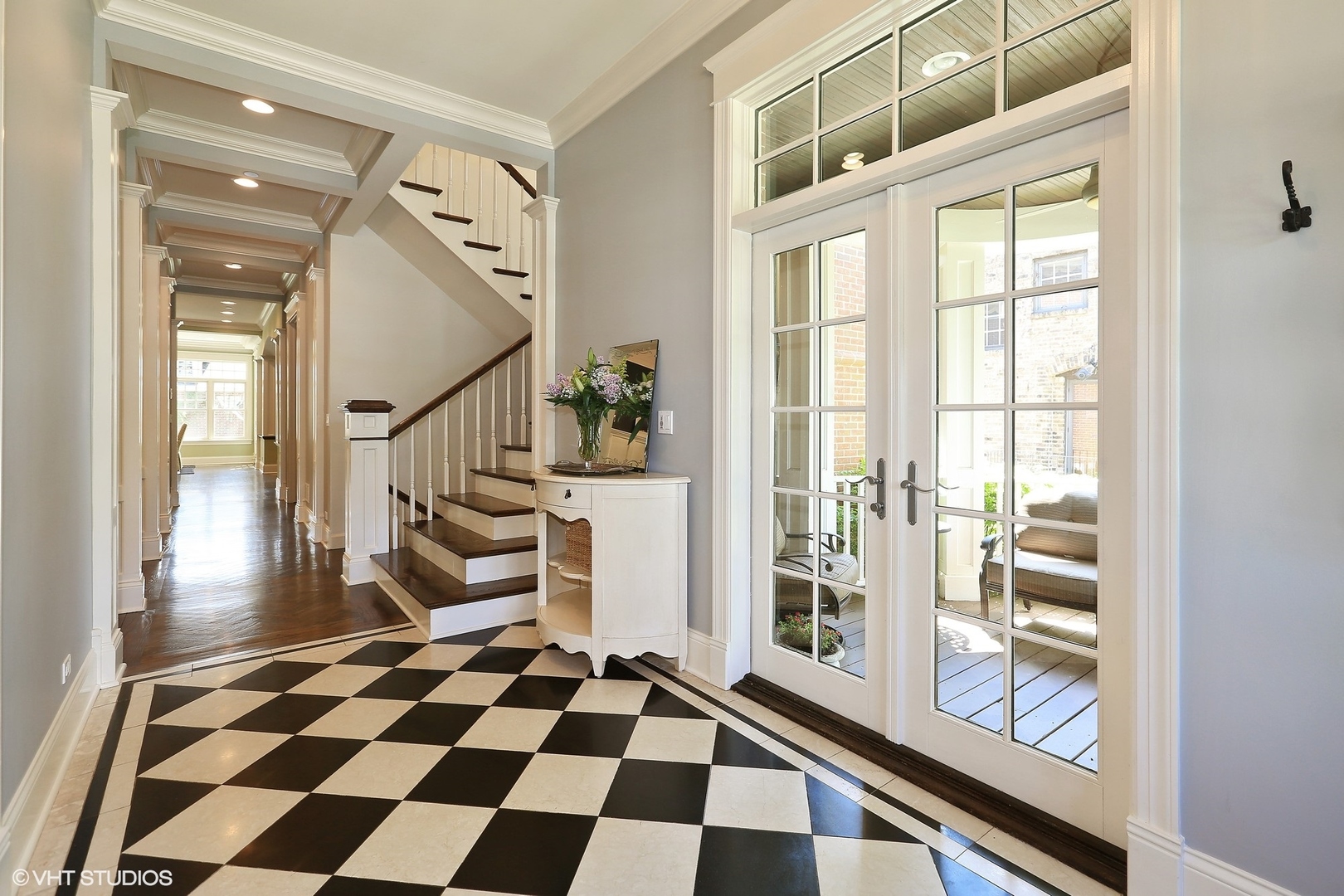 615 Courtland Avenue Park Ridge, IL 60068 - Photo 3 of 29 a black and white checkered floor with a large window