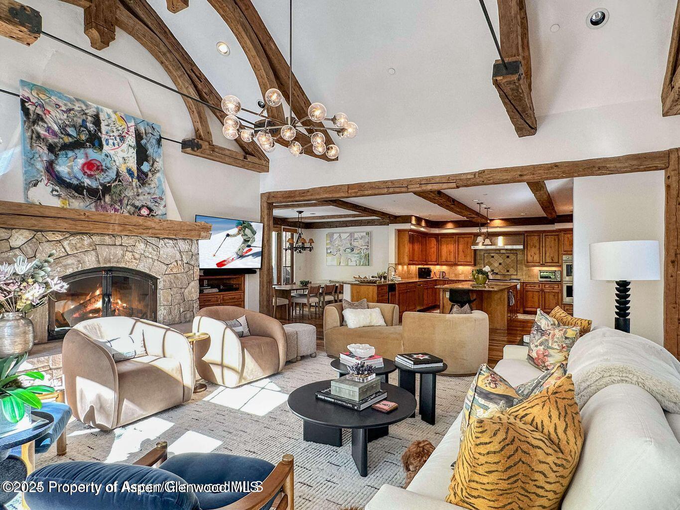 1540 Silver King Drive Aspen, CO 81611 - Photo 7 of 32 a living room with furniture and a fireplace