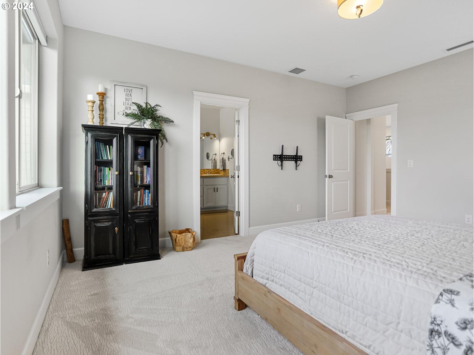 139 North 39th Court Ridgefield, WA 98642 - Photo 26 of 45 a bedroom with a bed and a walk in closet