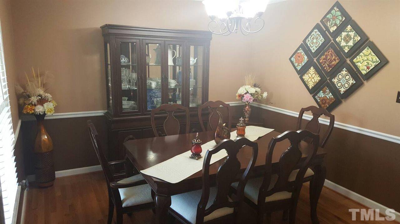 4401 Wolftrap Road Raleigh, NC 27616 - Photo 14 of 18 a dining room with furniture and window