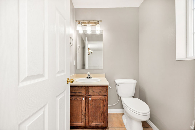 2 West 1780 North Logan, UT 84341 - Photo 15 of 24 Bathroom featuring vanity and light tile patterned flooring