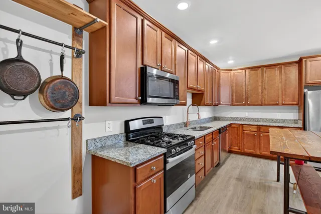 a view of a livingroom with furniture and window