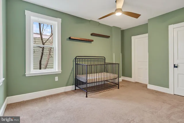 a view of a hallway with windows