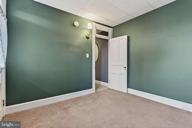 a view of a balcony with wooden floor