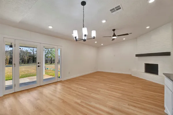a bathroom with a shower and a toilet
