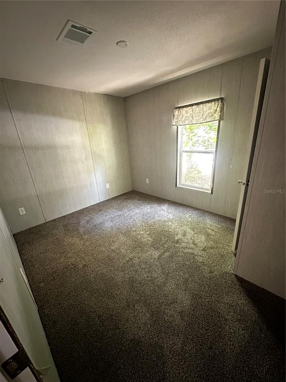 3060 Southeast 48th Street Ocala, FL 34480 - Photo 4 of 10 a view of room and window