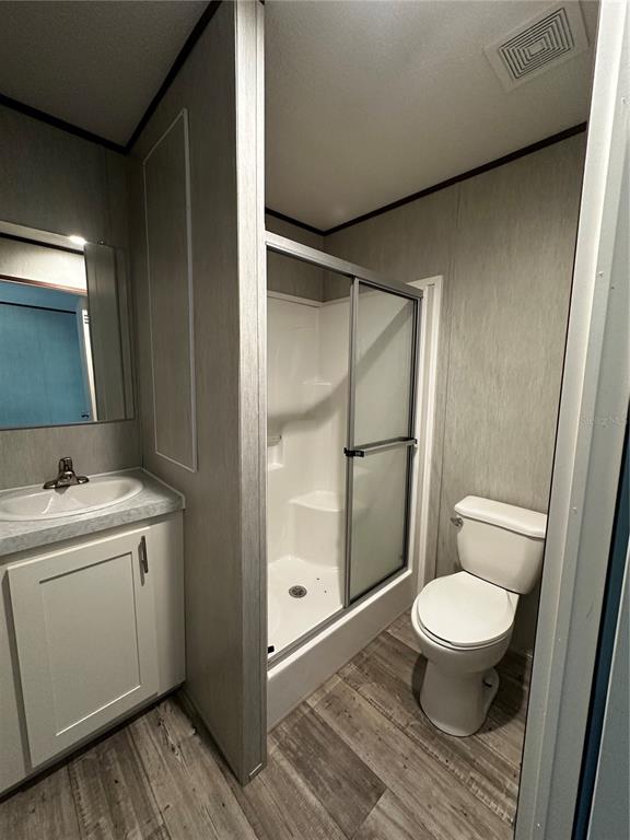 3060 Southeast 48th Street Ocala, FL 34480 - Photo 8 of 10 a bathroom with a granite countertop toilet sink and shower