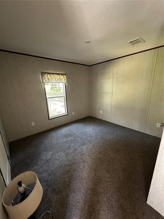 3060 Southeast 48th Street Ocala, FL 34480 - Photo 9 of 10 a view of an empty room with a window
