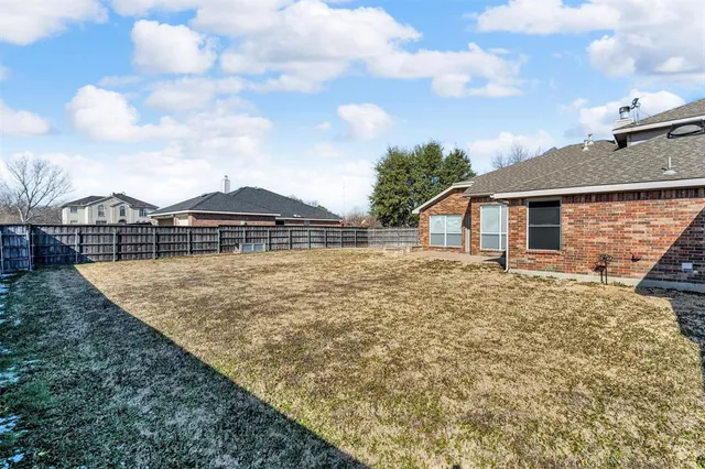 a front view of house with yard