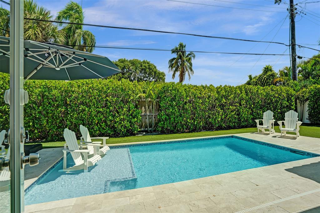 2185 Northeast 61st Court Fort Lauderdale, FL 33308 - Photo 13 of 49 a view of yard with seating area
