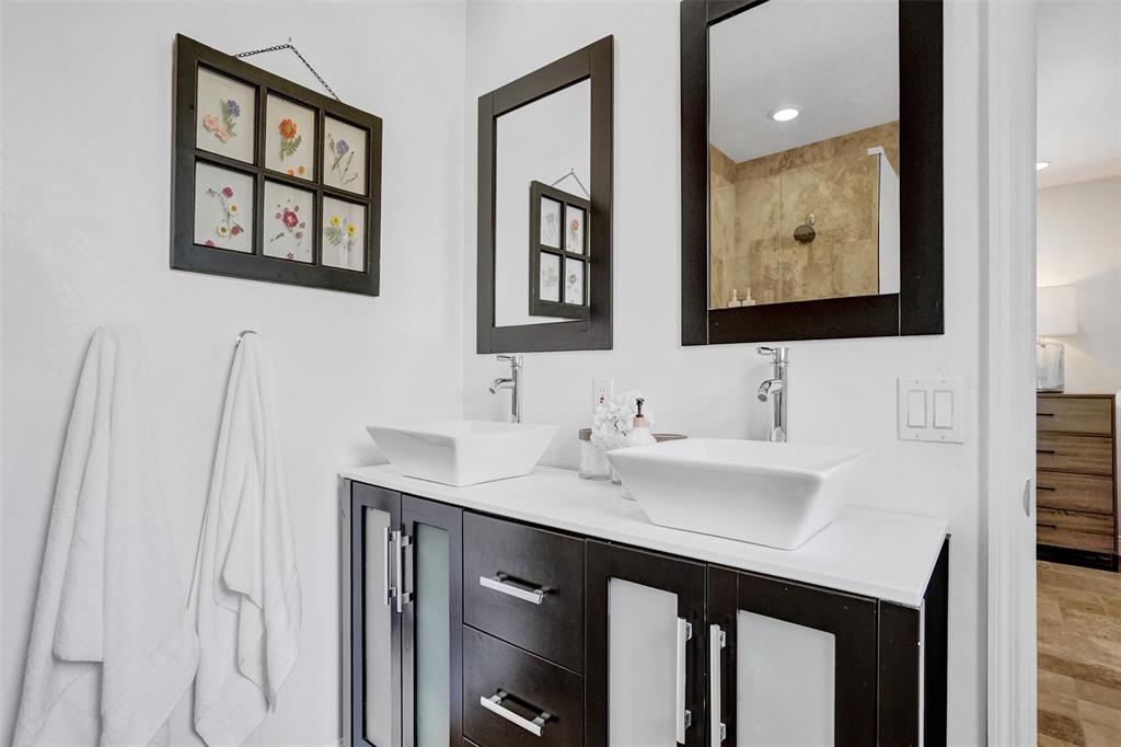 2185 Northeast 61st Court Fort Lauderdale, FL 33308 - Photo 22 of 49 a bathroom with a sink and a mirror