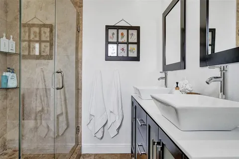 a front view of a house with mirror gate