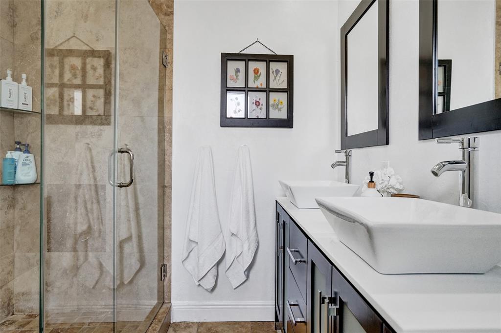 2185 Northeast 61st Court Fort Lauderdale, FL 33308 - Photo 23 of 49 a bathroom with a sink and a mirror