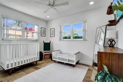 a room with furniture and a window