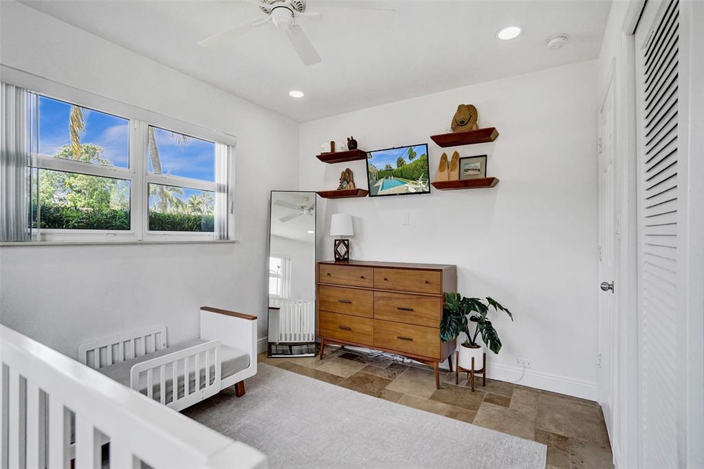 2185 Northeast 61st Court Fort Lauderdale, FL 33308 - Photo 35 of 49 a room with furniture and a window