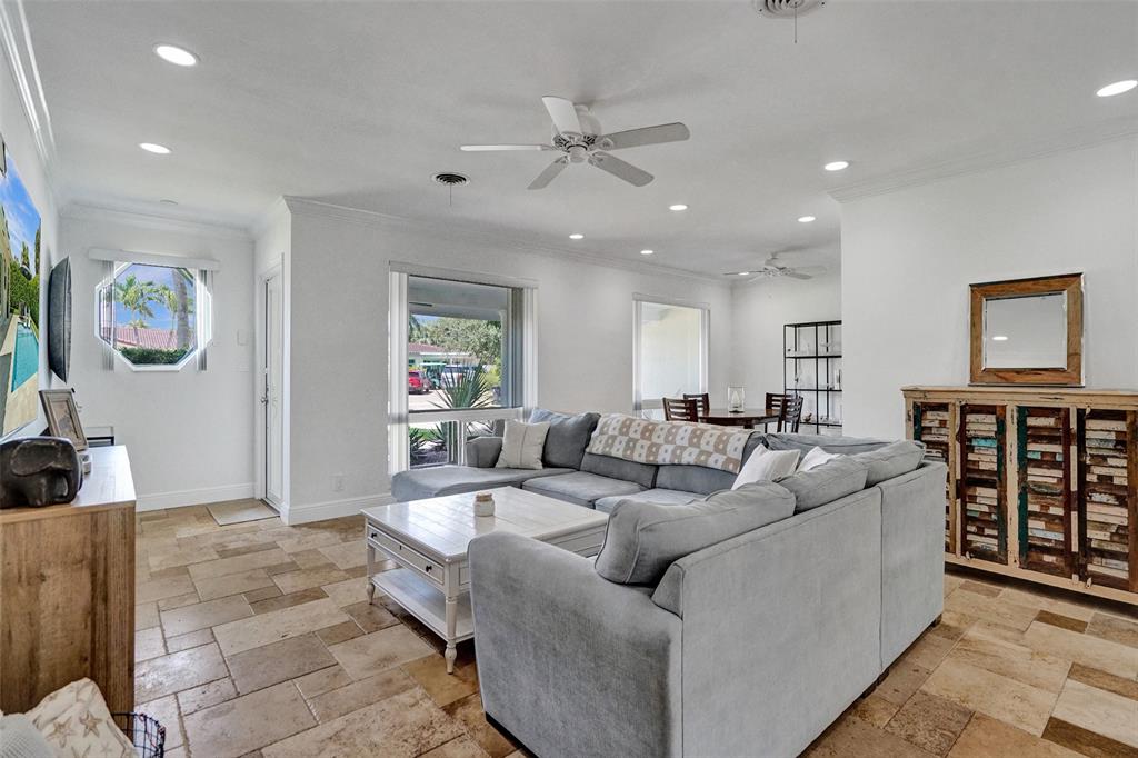 2185 Northeast 61st Court Fort Lauderdale, FL 33308 - Photo 4 of 49 a living room with furniture and ceiling fan