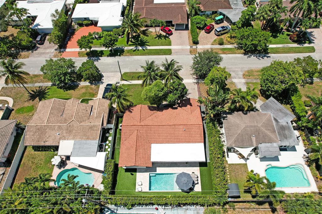 2185 Northeast 61st Court Fort Lauderdale, FL 33308 - Photo 49 of 49 an aerial view of multiple houses with yard