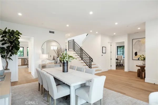 a kitchen with a sink cabinets and window