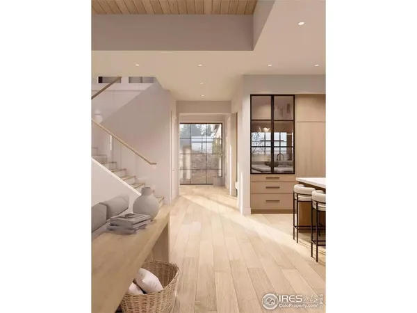 a room with a table chairs and a view of living room