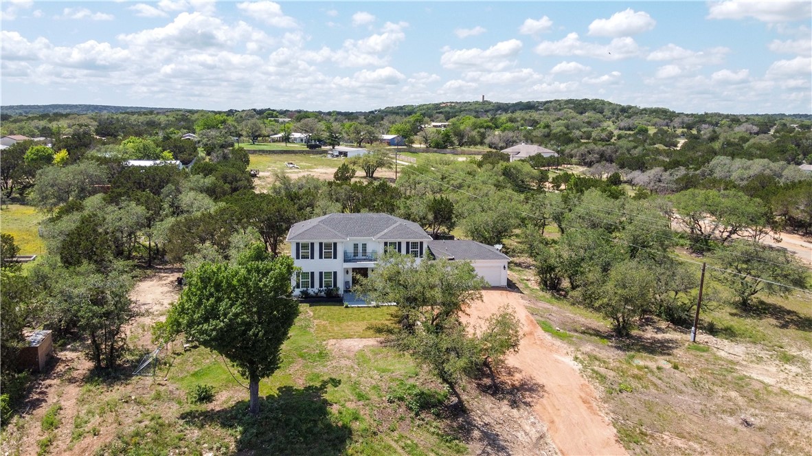 a view of a city with a building in the background